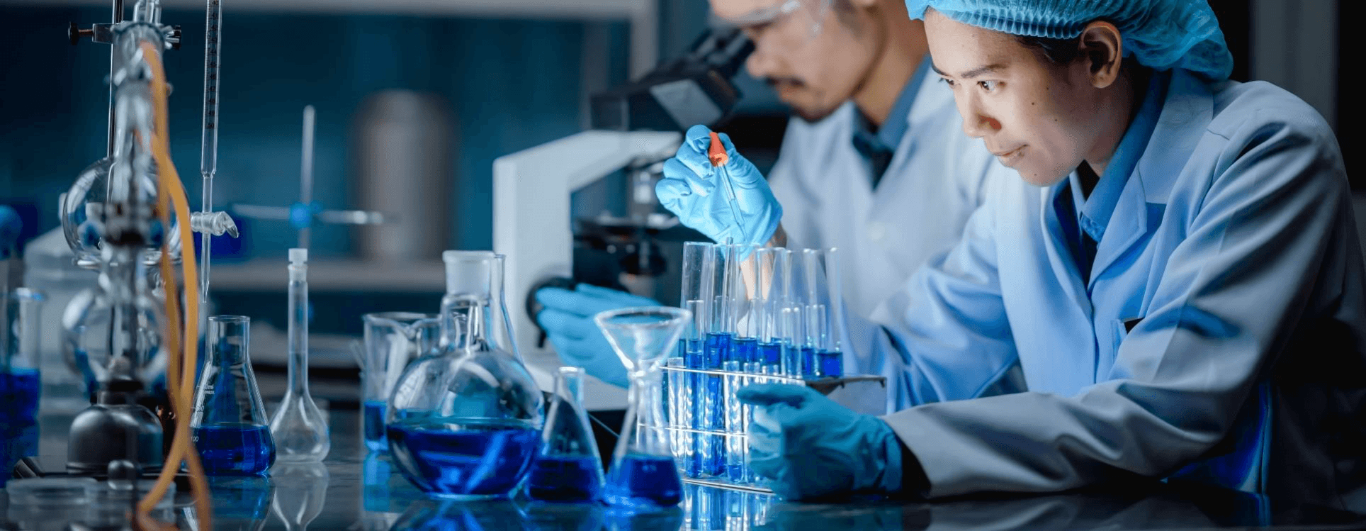 Laboratory professionals working with diagnostic samples and equipment